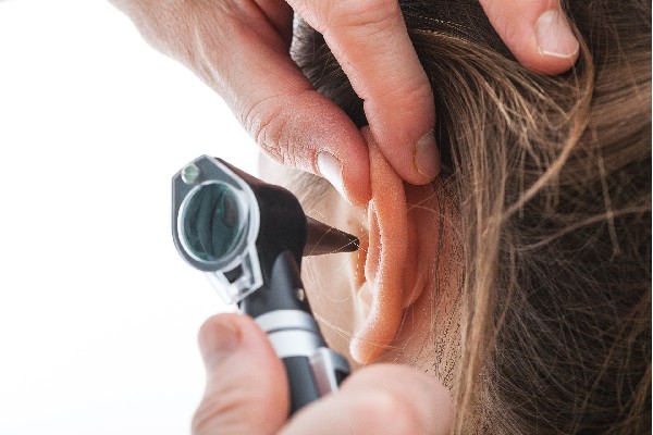 dr_looking_inside_ears